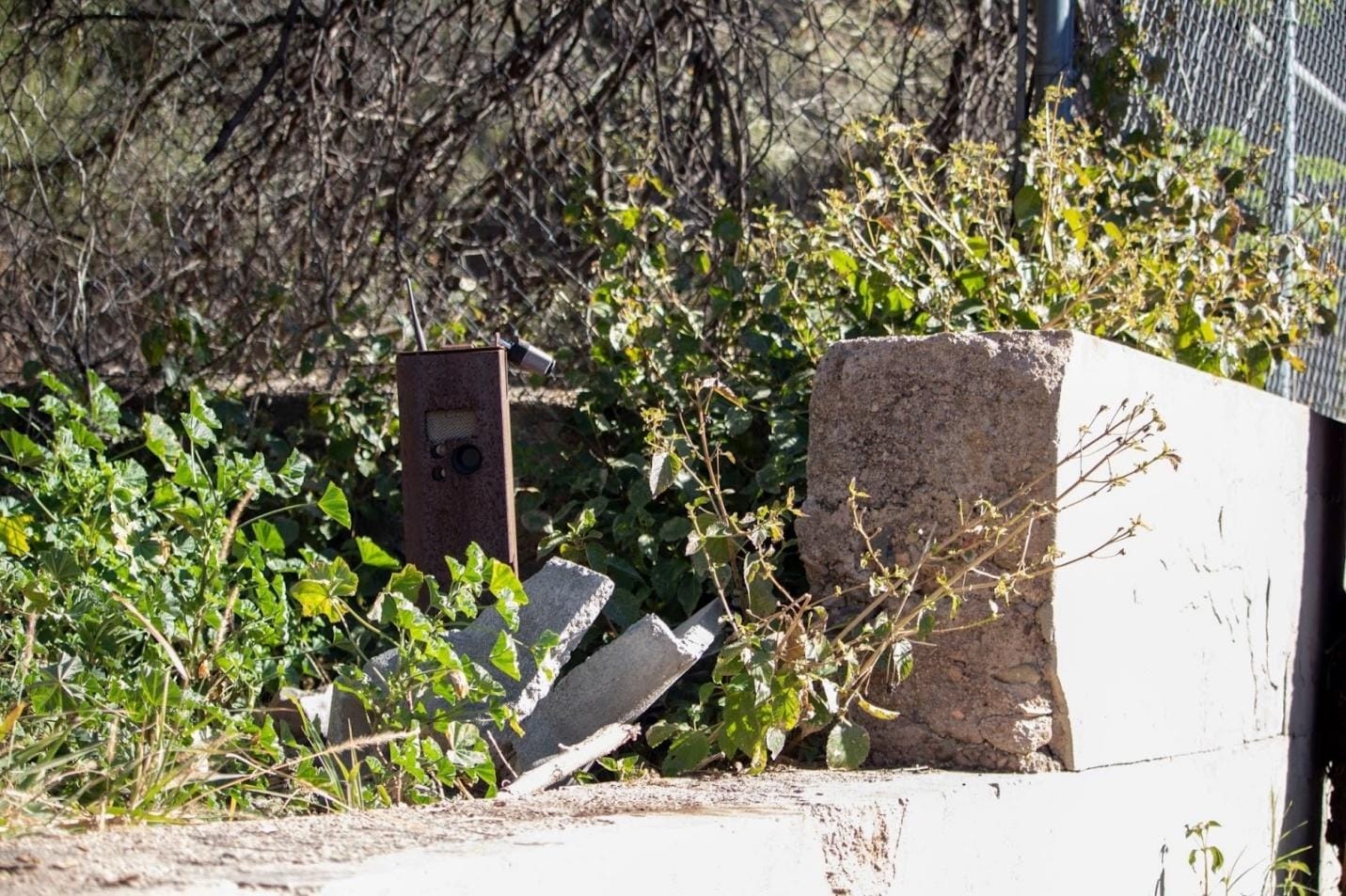 A broken concrete blocks and a concrete block
AI-generated content may be incorrect.